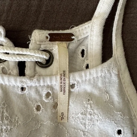 Free People Women’s Small White Eyelet Top Raw Hem Lace Up Back Embroidered Boho - Picture 3 of 12